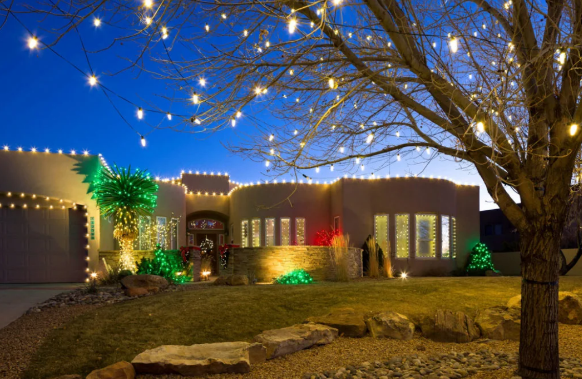 Southwest pathway lined with luminarias and warm white lights