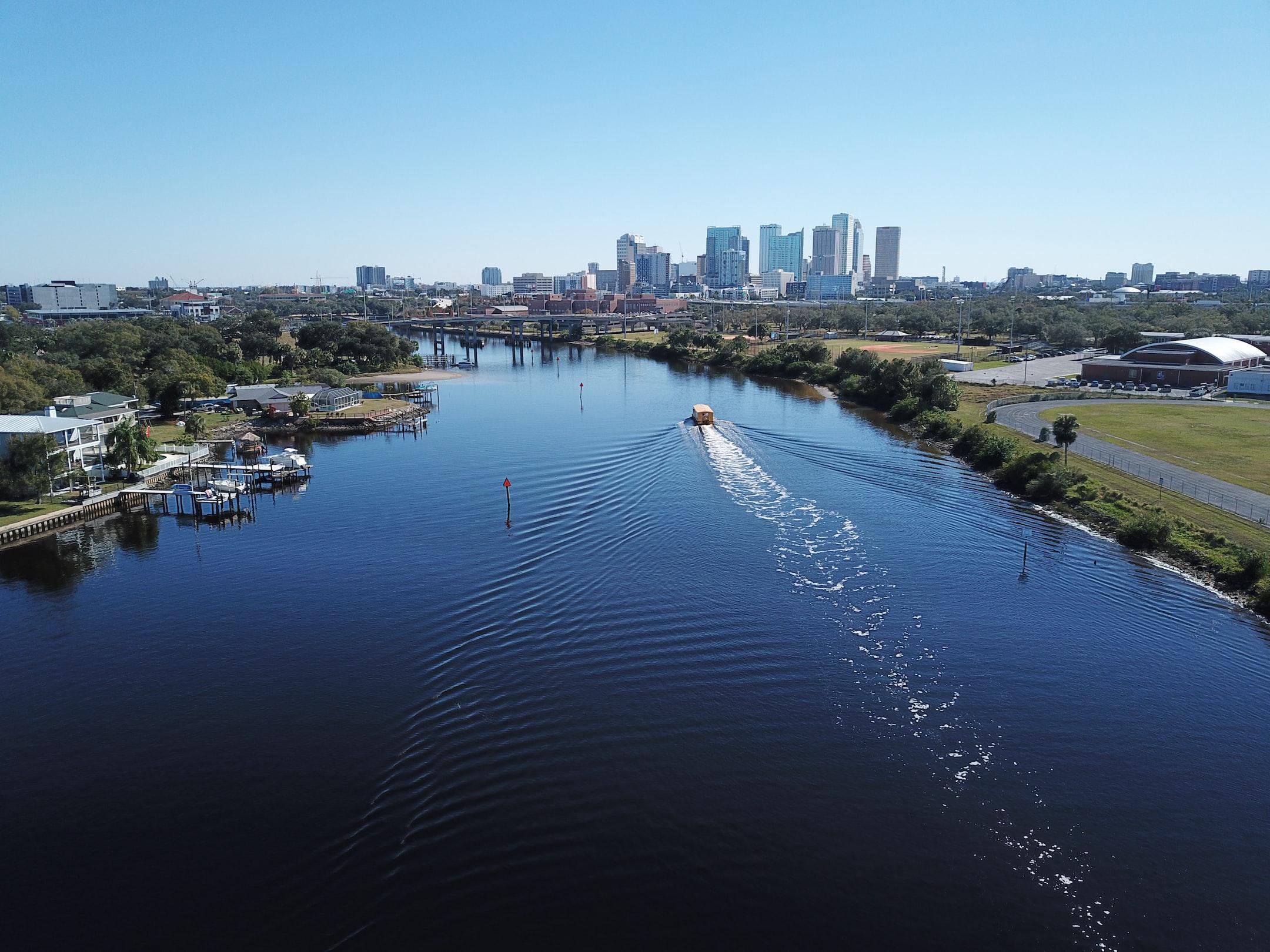 Aerial Drone Photography of downtown Tampa, Florida, and the water taxi on the Hillsborough river by Anita Denunzio.