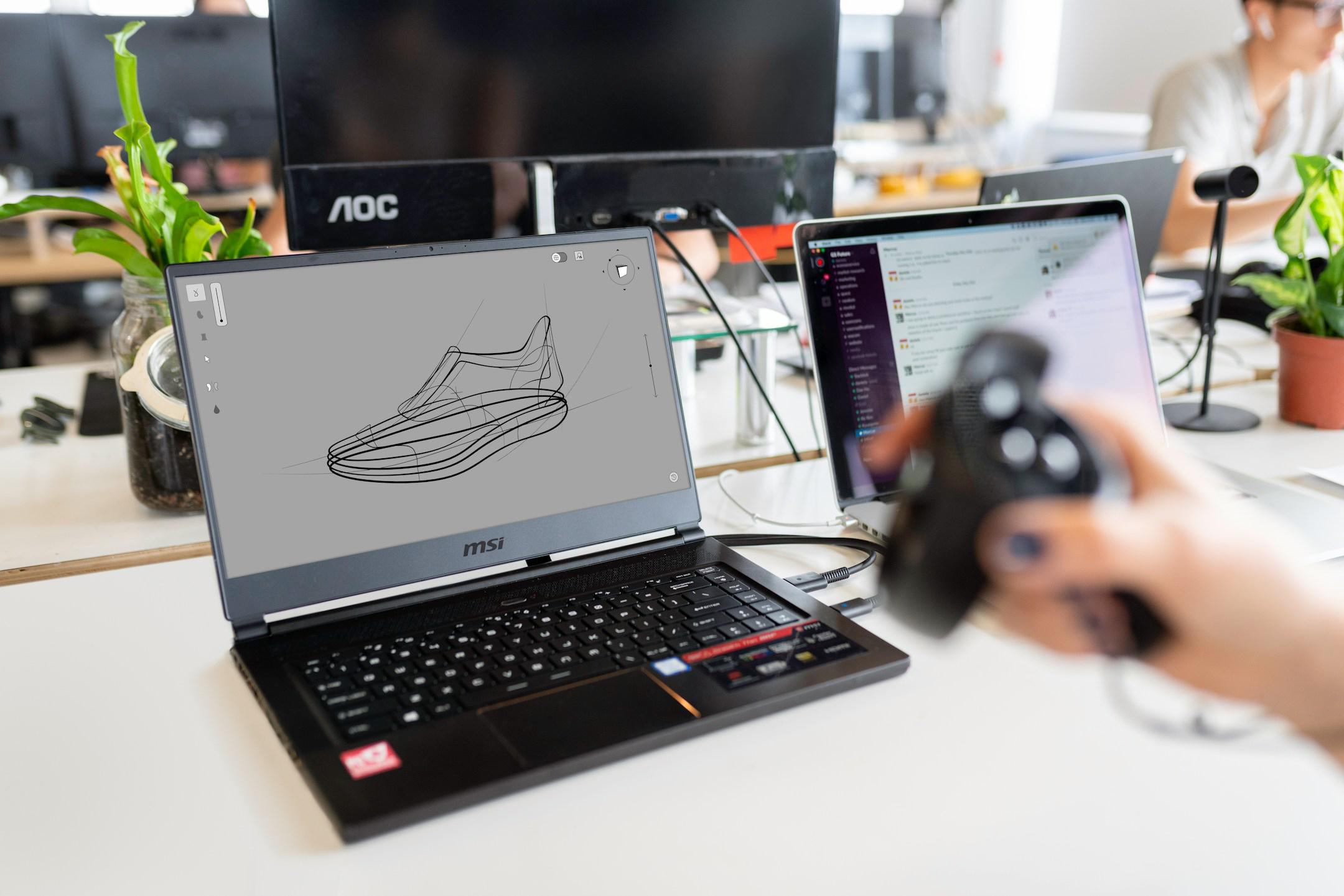 Female design engineer tests virtual reality software