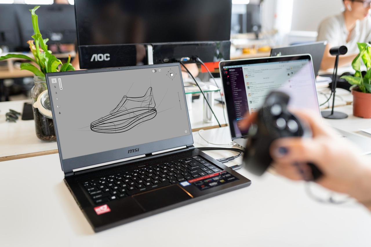 Female design engineer tests virtual reality software