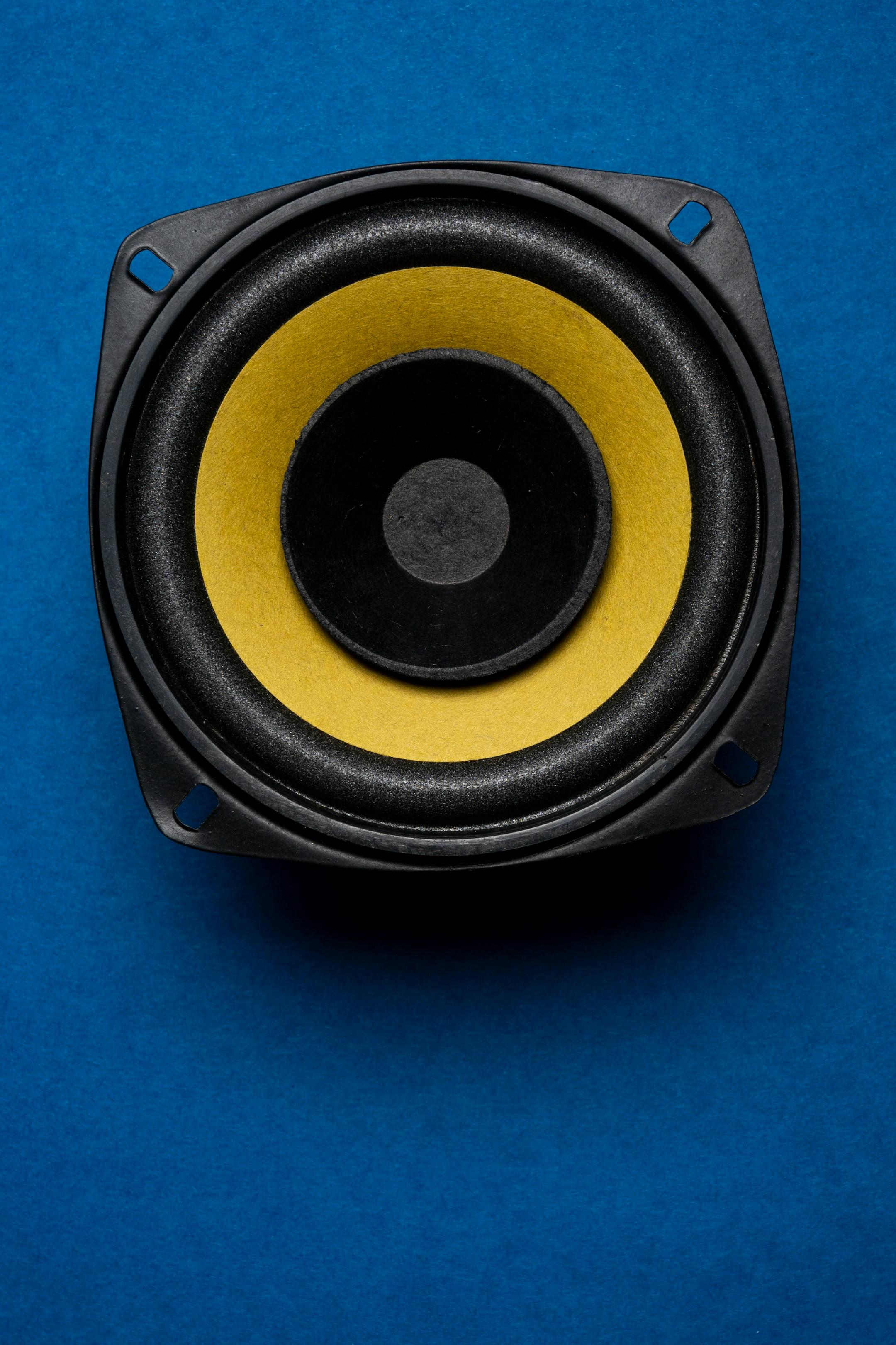Audio speaker isolated on blue background, Music system background
