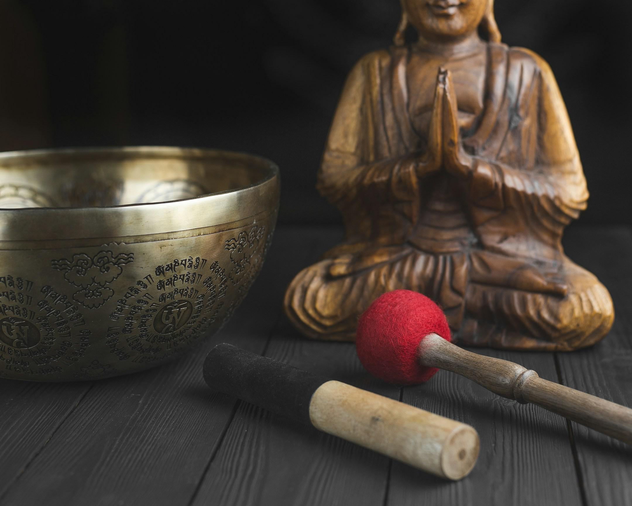 Tools for meditation   tibetan singing bowl, sticks, statue