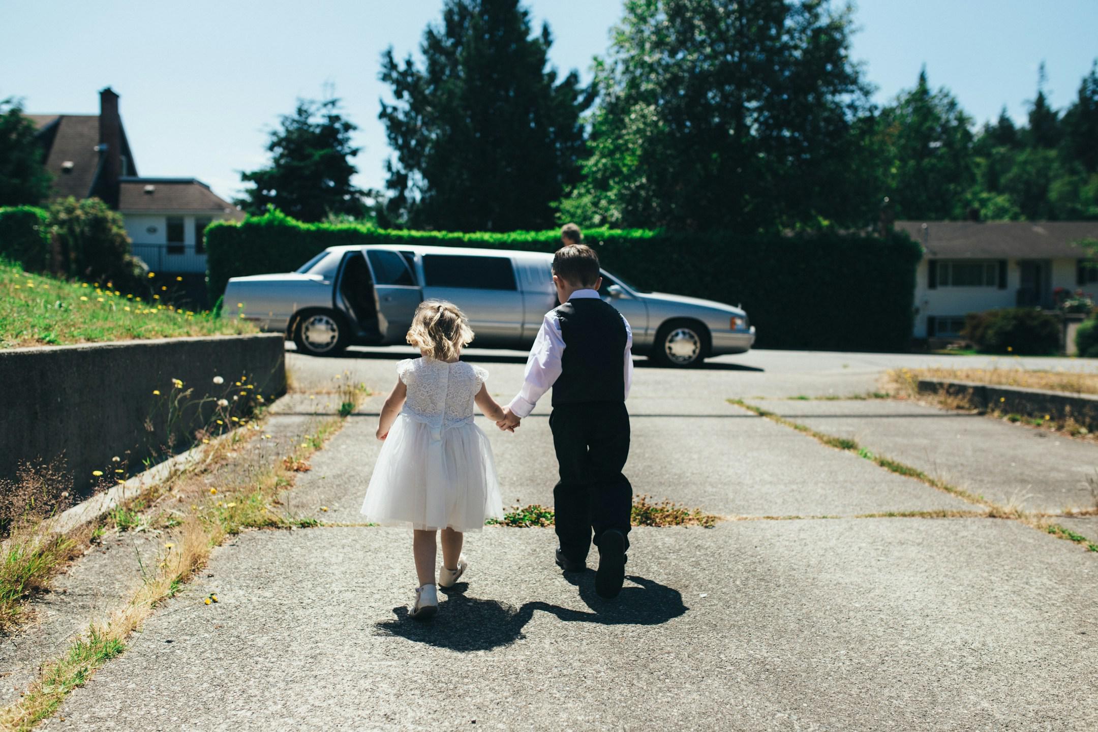 I was able to get the ring bearer and flower girl to hold hands as they walked to the limo for a client’s wedding. Good day.
