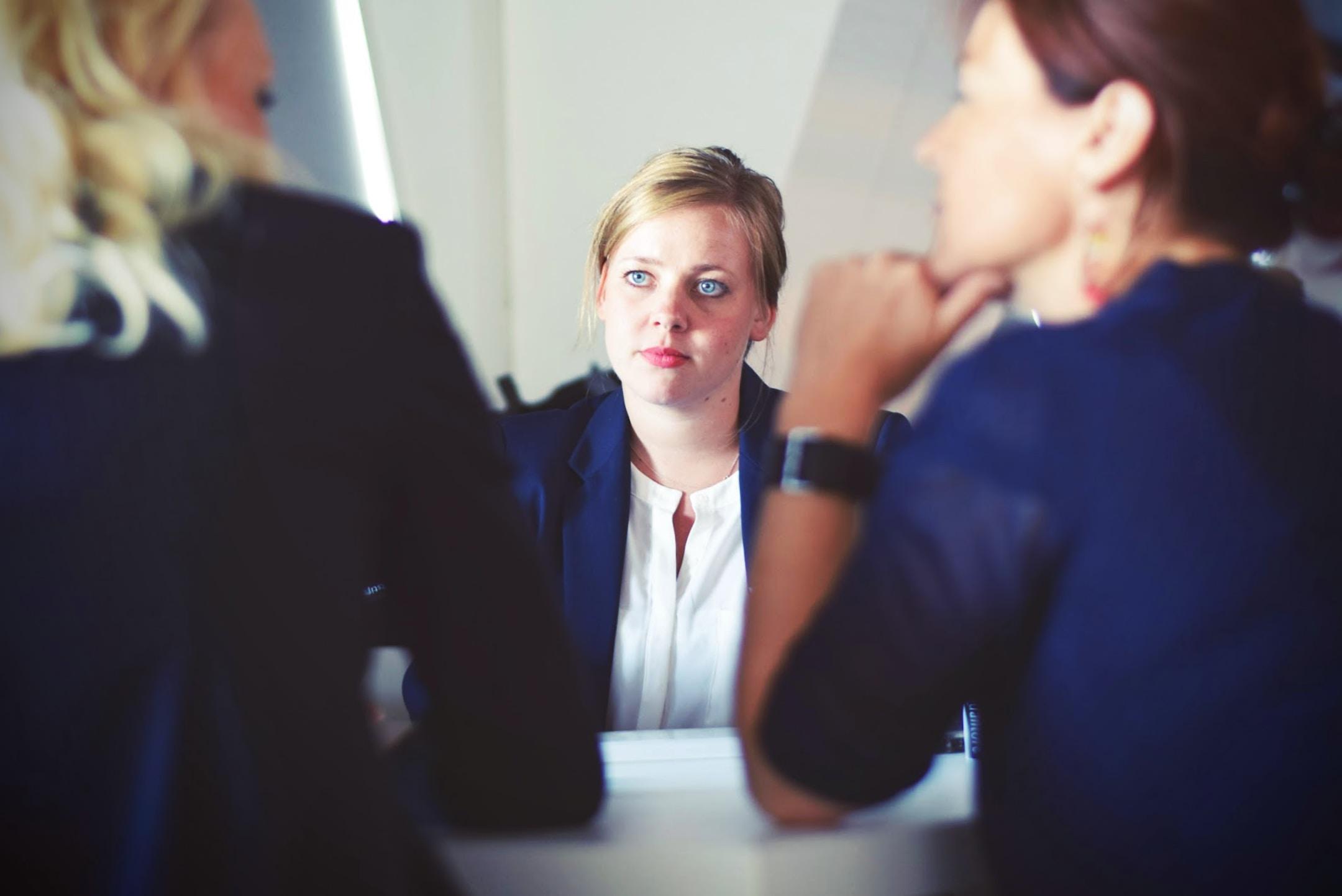 Image of a woman meeting with accident attorneys in Wilmington, NC.