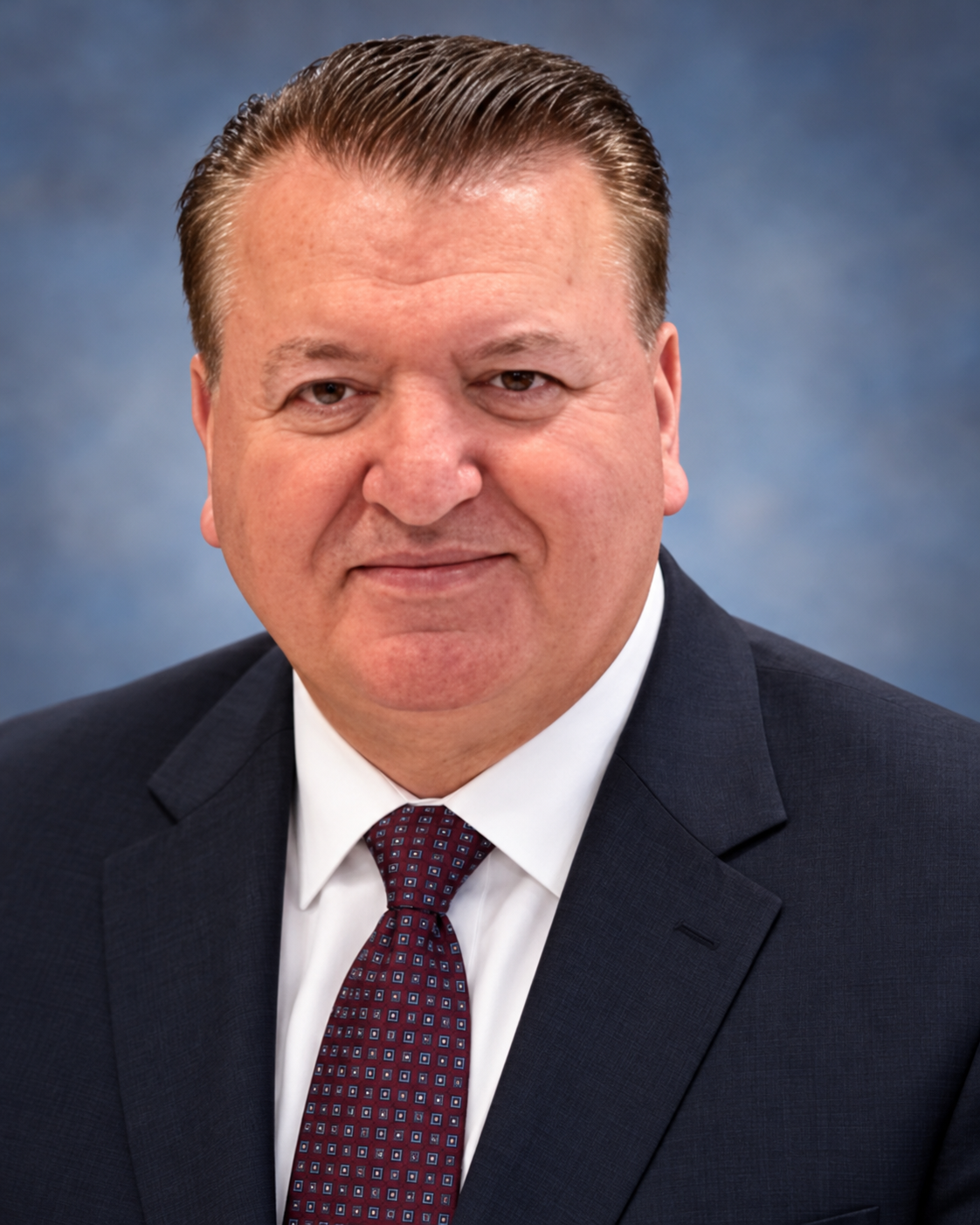 Portrait of Dr. Elmi Berisha, President of VATRA
