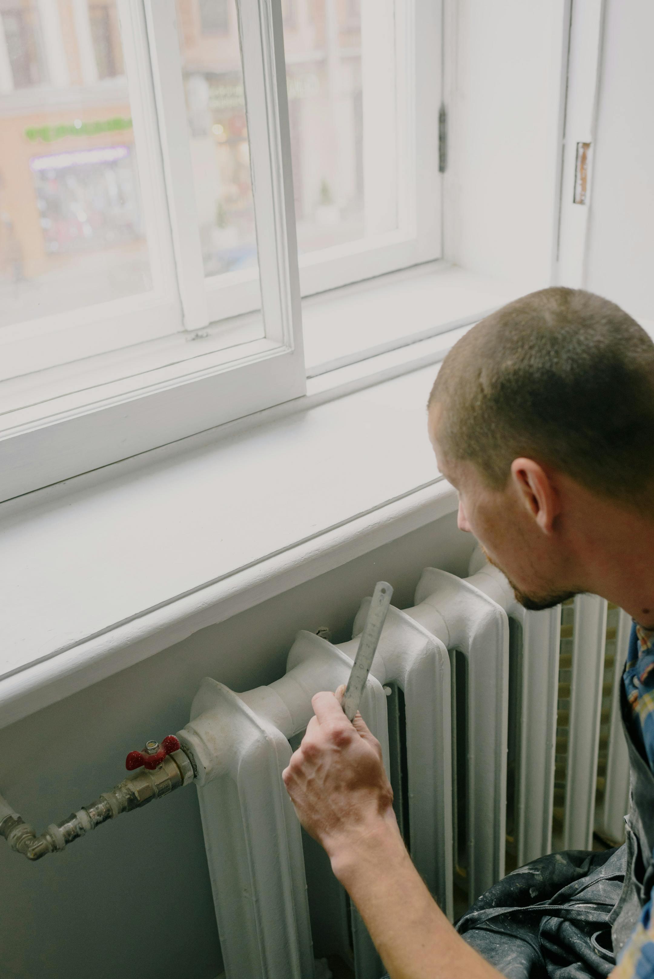 Man contemplating furnace repair