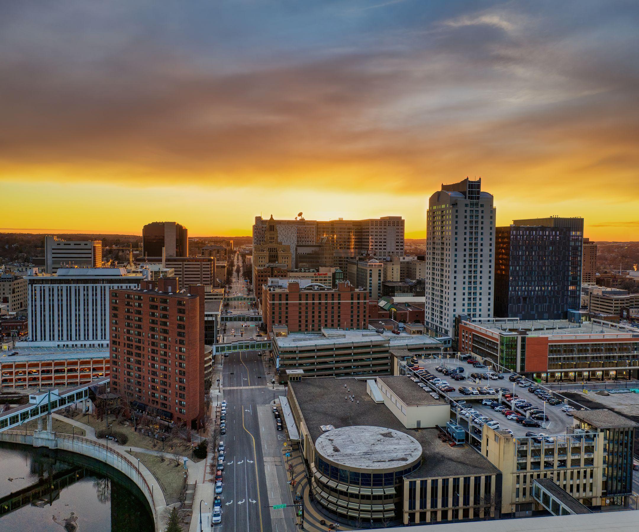 A stunning aerial view of Rochester, MN skyline at sunset capturing urban architecture.