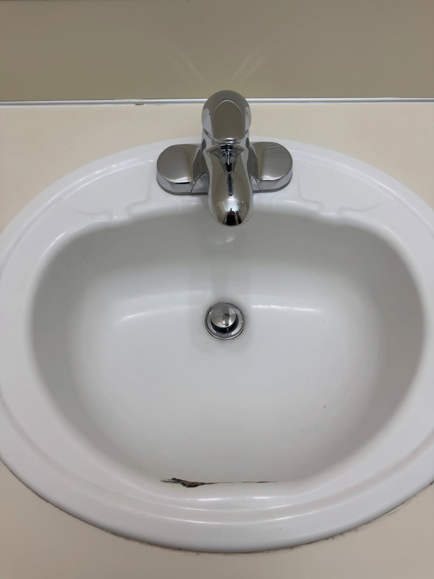 Sparkling bathroom sink with crystal clear fixtures after professional deep cleaning Adelaide