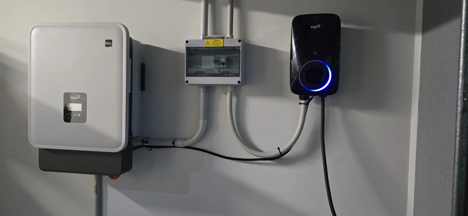 FoxESS EV charger installed beside a FoxESS inverter and switchboard in Melbourne's west