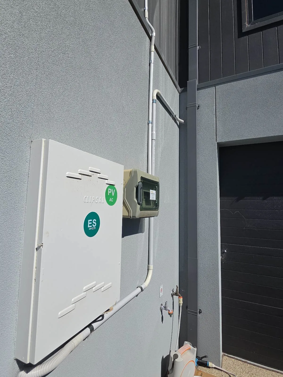 Neat conduit run from the meter box for a FoxESS EV charger at a Wyndham Vale townhouse