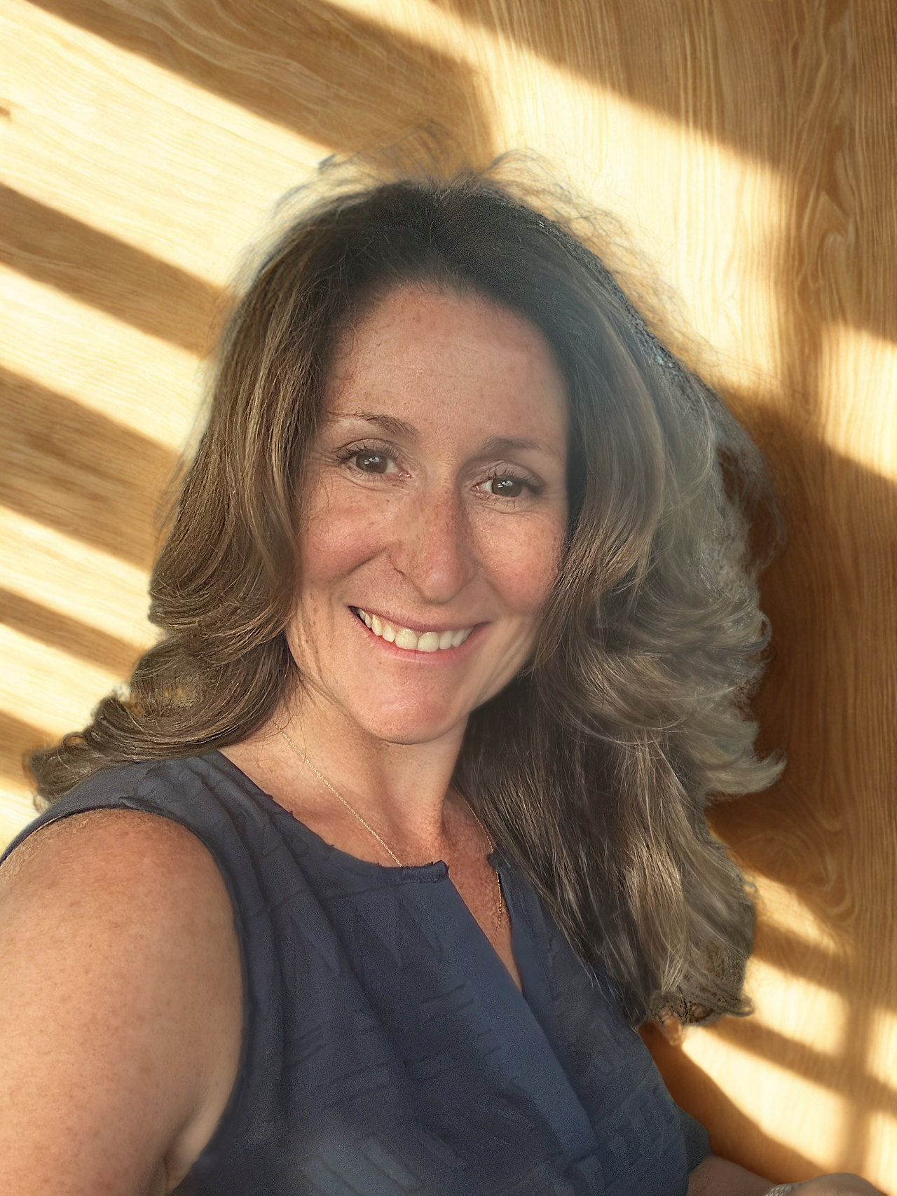 ag headshot light background.png