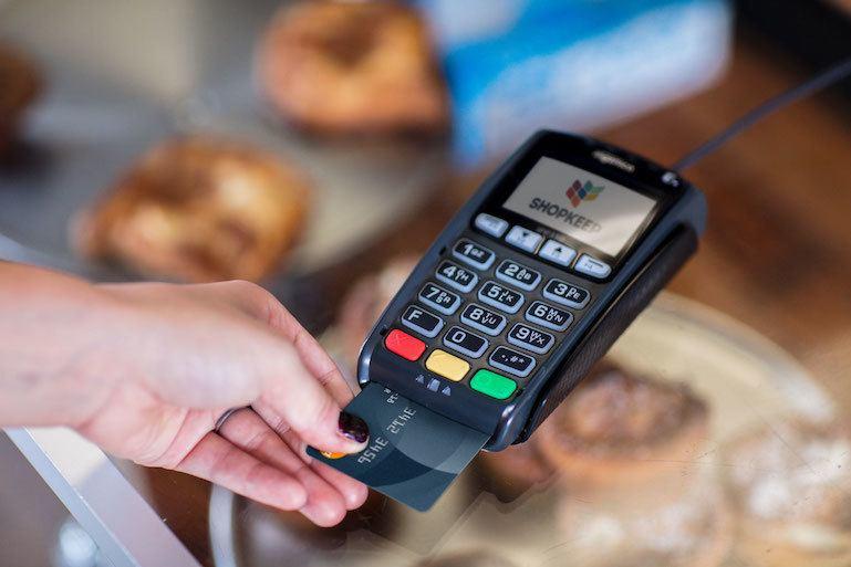 how-to-reduce-credit-card-processing-fees_credit-card-reader.jpg