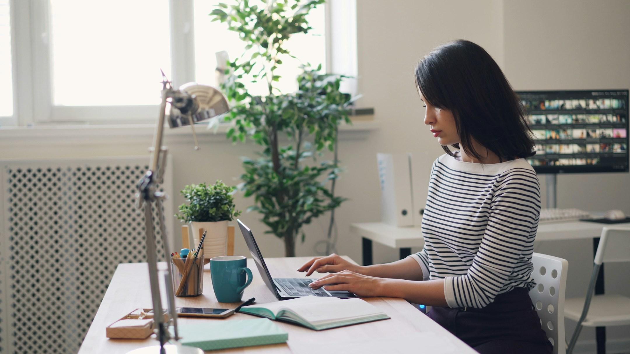 Young woman working with laptop