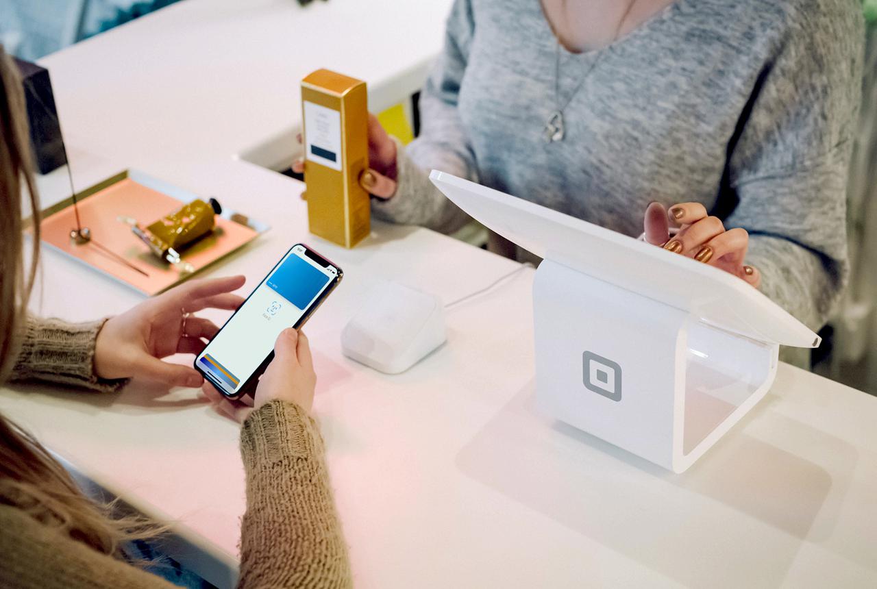 Image of someone using merchant services in California.