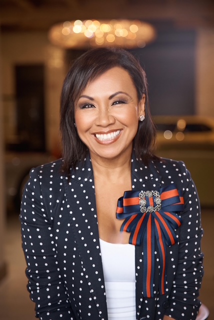 Professional photo demonstrating her active engagement in her work
