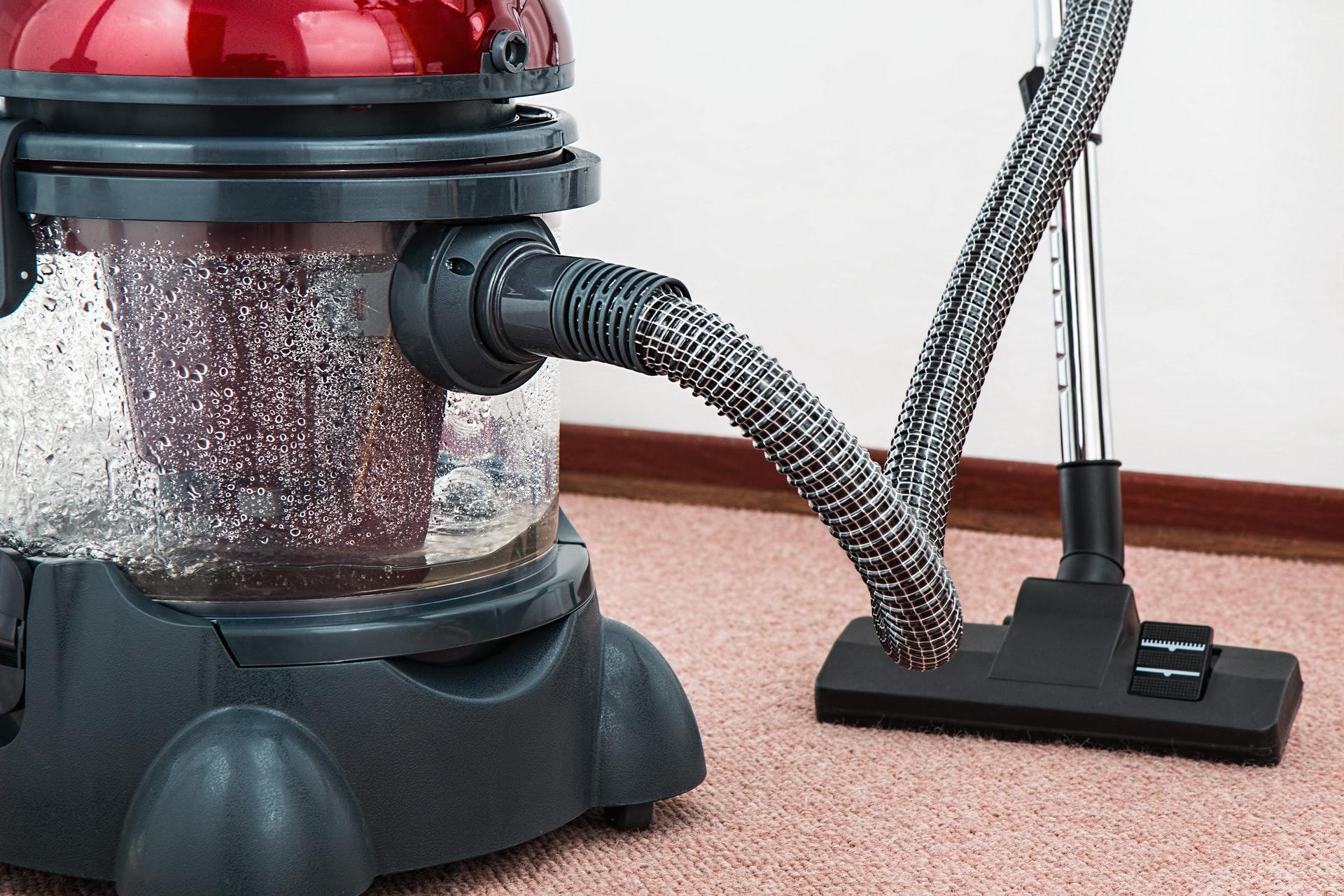 Vaccum cleaner on recently cleaned carpet