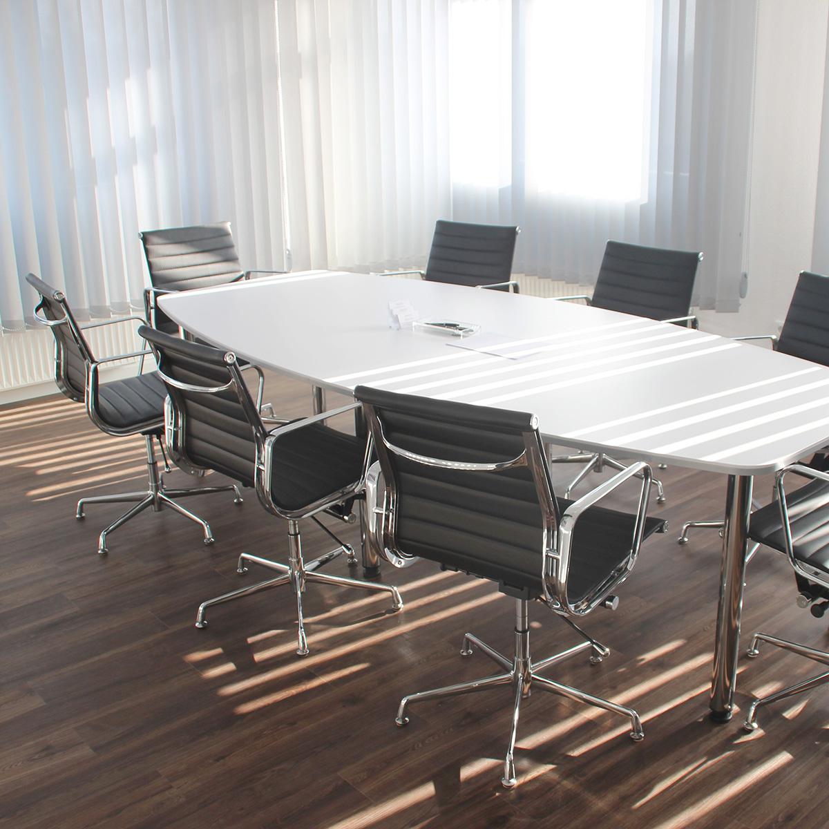A conference room with sunlight pouring in.