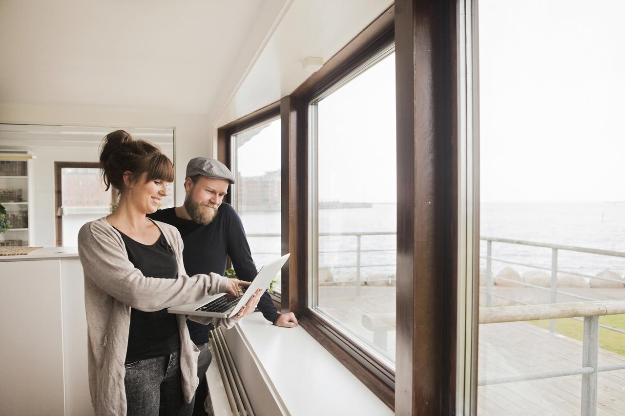 Couple choosing window installation