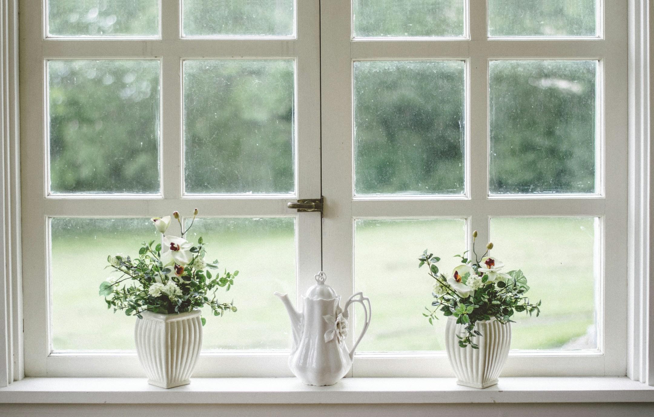 Porcelain teapot on windowsill