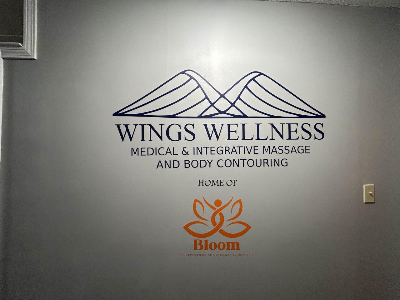 wingswellnesswallsign.jpg