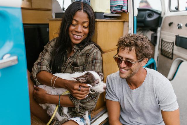 A couple exploring RV parks near Phoenix, AZ with their dog