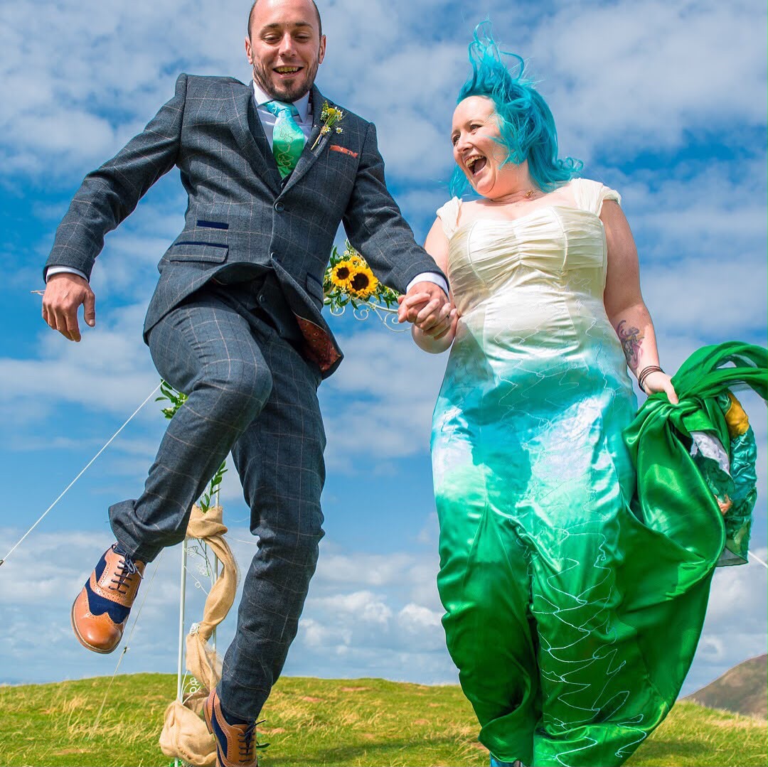 Couple celebrating after their outdoor ceremony