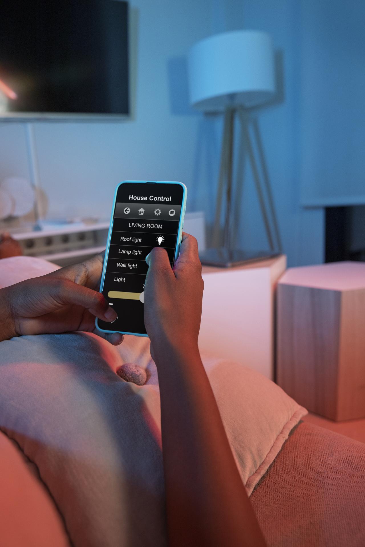 hand-holding-smartphone-home.jpg