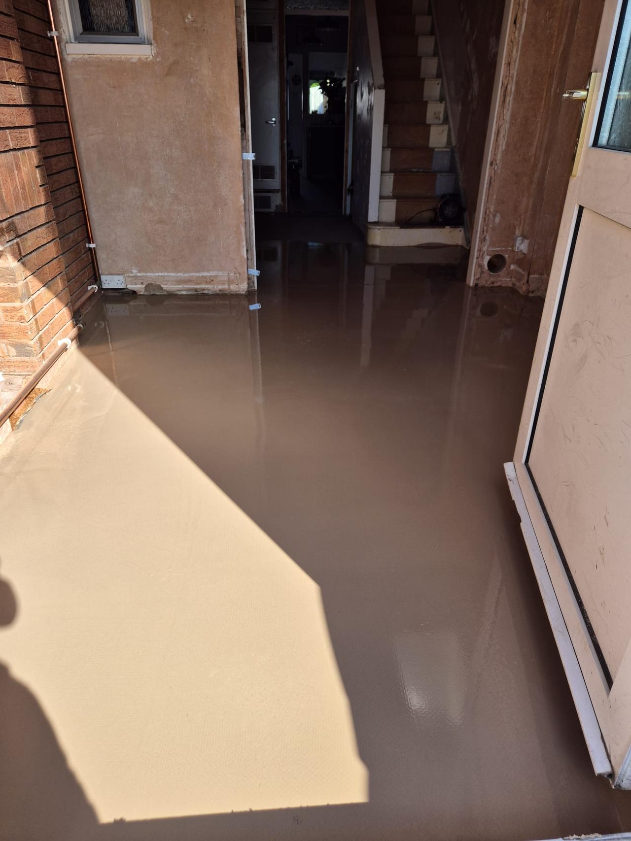 Professional floor levelling in Coventry using self-levelling compound for a smooth, even base before tiling installations