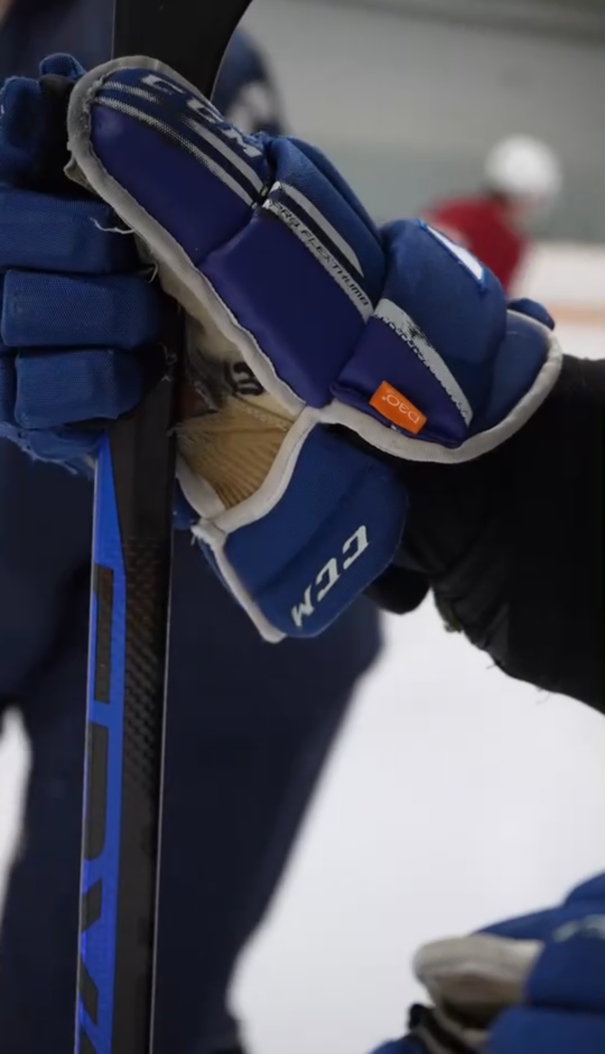 Young hockey players executing a skill drill during training