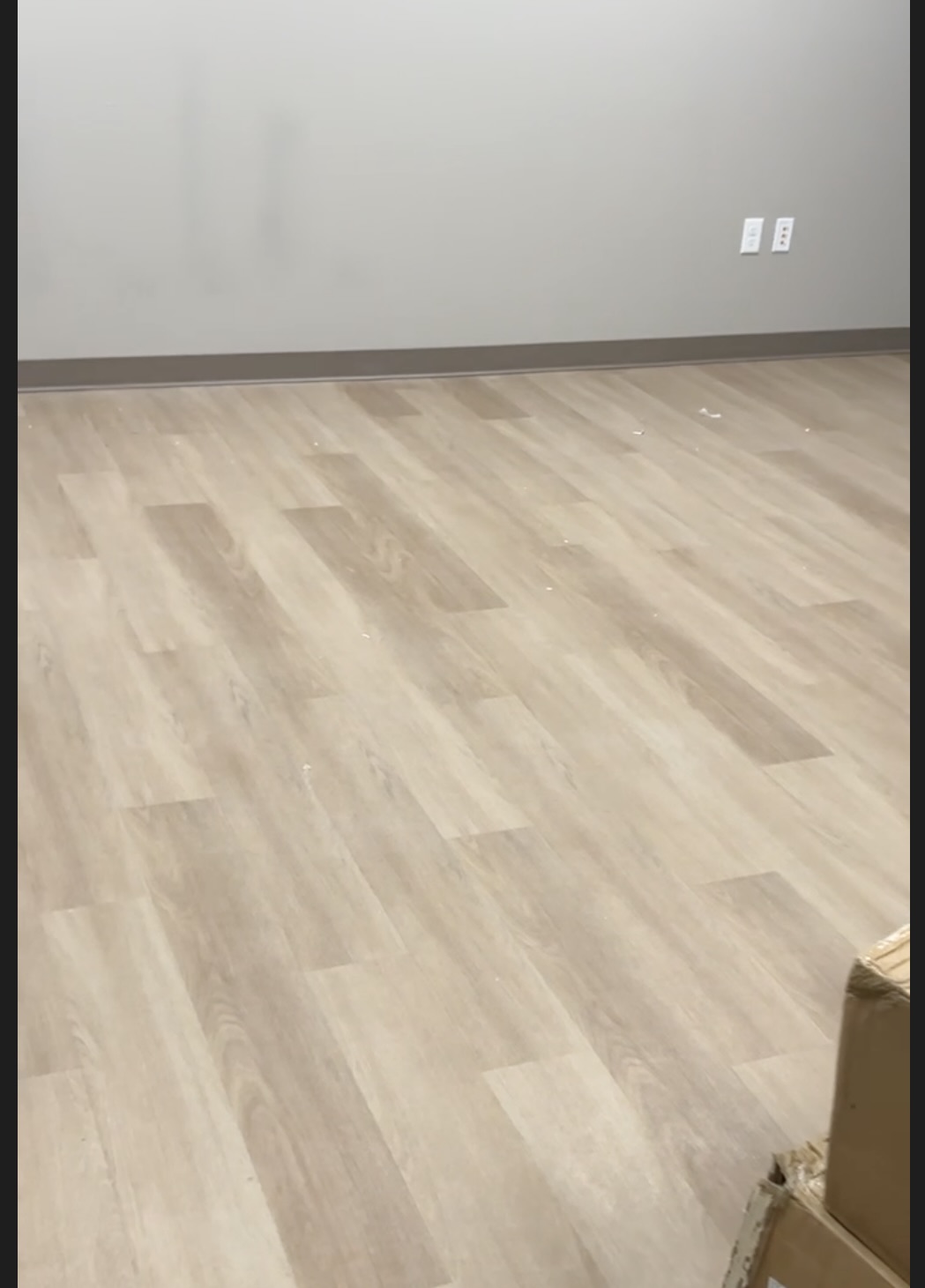 Clean medical office waiting room with comfortable seating and professional decor