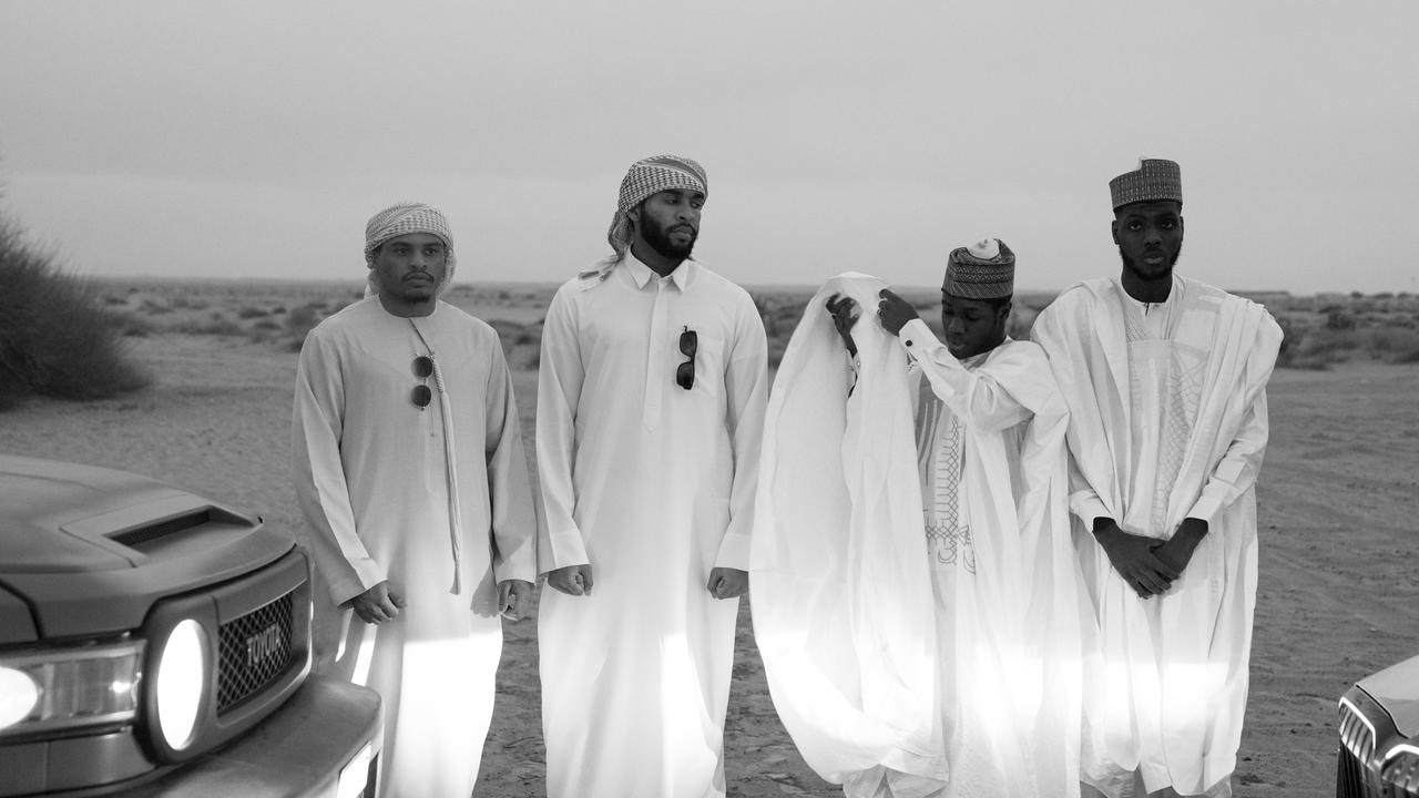 Black and White of MMD Team in Desert