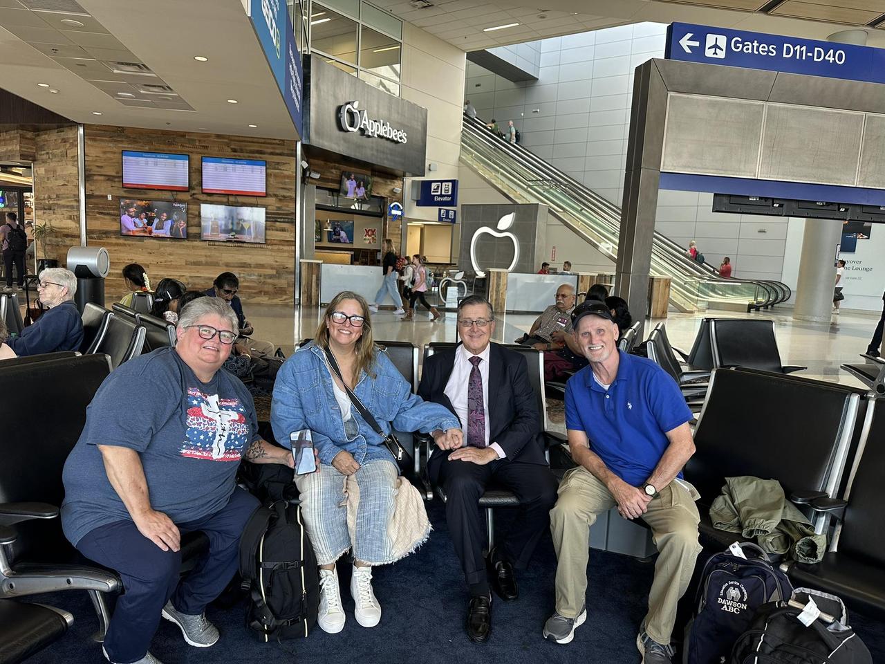 2025 crew at airport heading to uganda.jpg