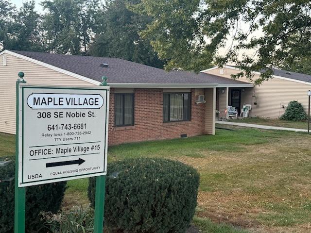 maple village with sign.jpg