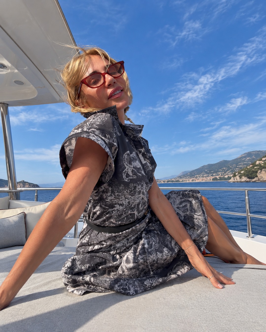 Sylwia Kaminska on deck of a luxury superyacht, showcasing Saint-Tropez maritime luxury and professional yacht charter expertise