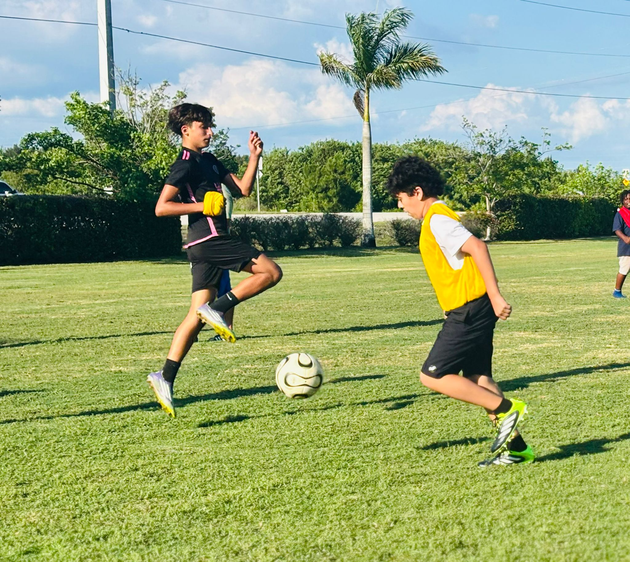 Diverse young soccer players celebrating with energy and joy on the field