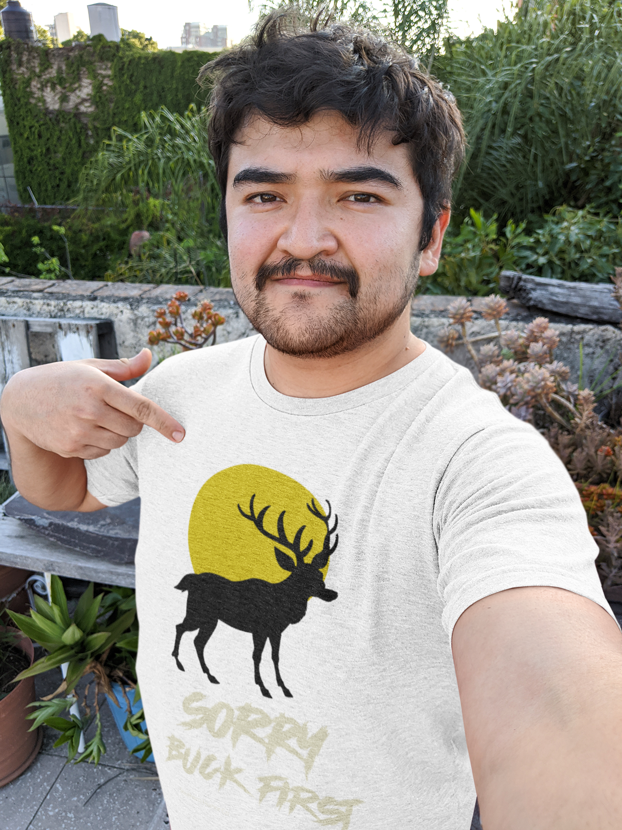selfie-mockup-of-a-man-pointing-at-his-heathered-t-shirt-36764.png