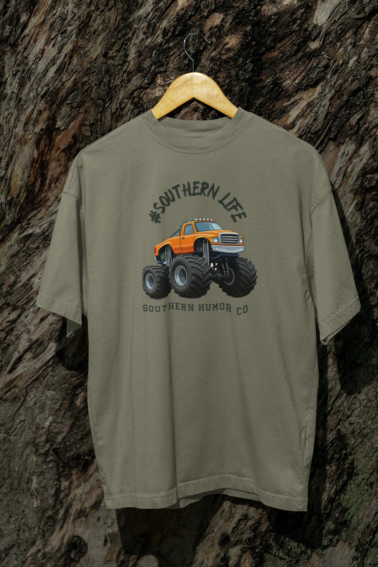 mockup-of-an-oversized-t-shirt-placed-on-a-hanger-by-tree-log-m39837 (2).png
