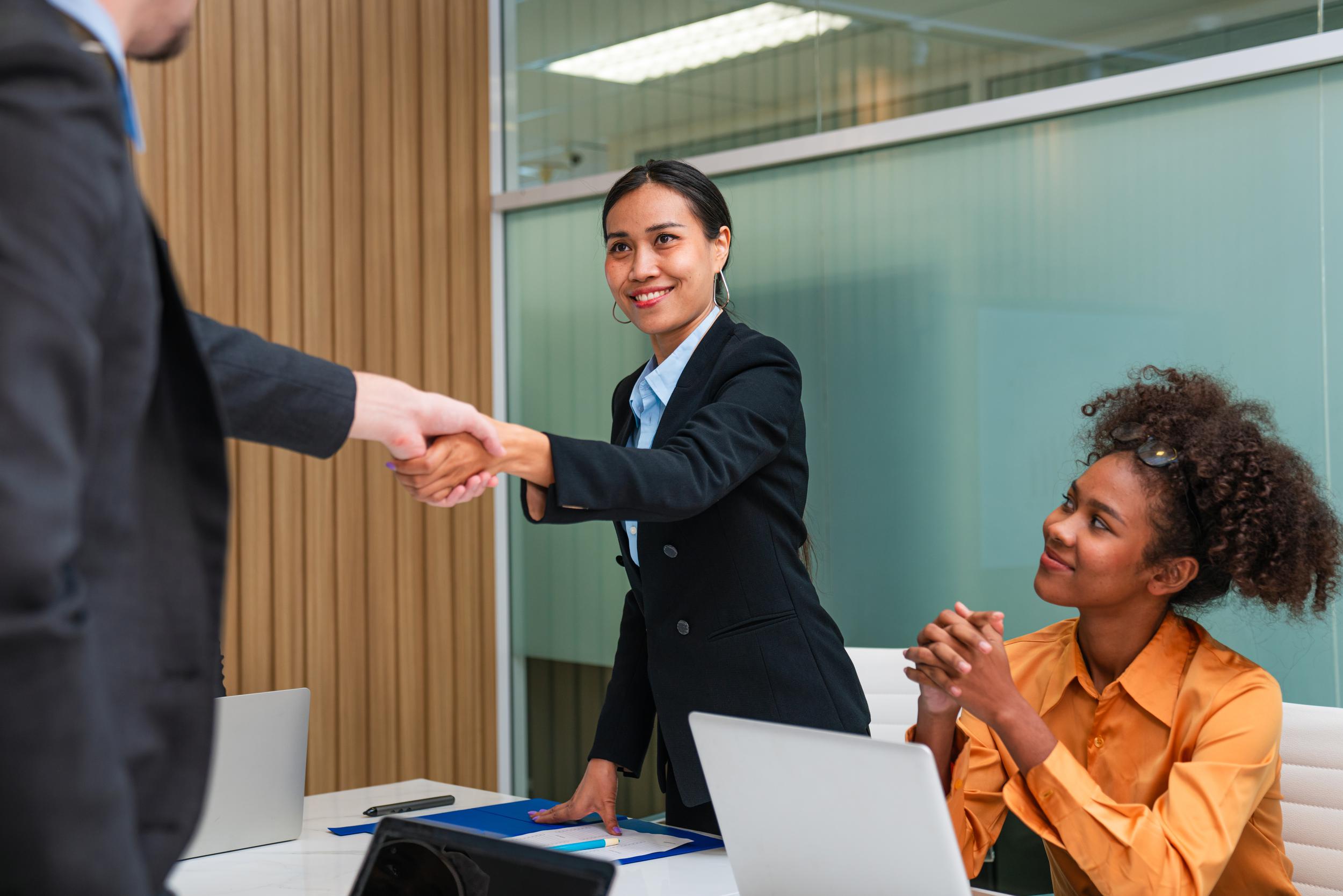 multiracial-business-people-having-meeting-and-bra-2024-07-09-00-48-37-utc.jpg