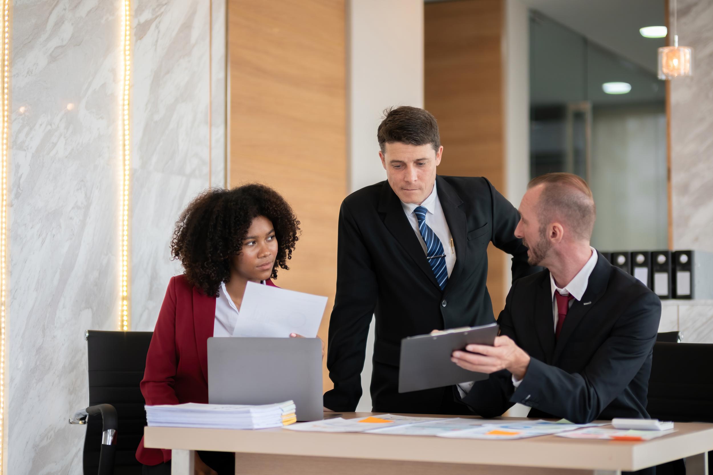 diverse-business-team-discussing-project-at-office-2025-01-16-13-30-33-utc.jpg