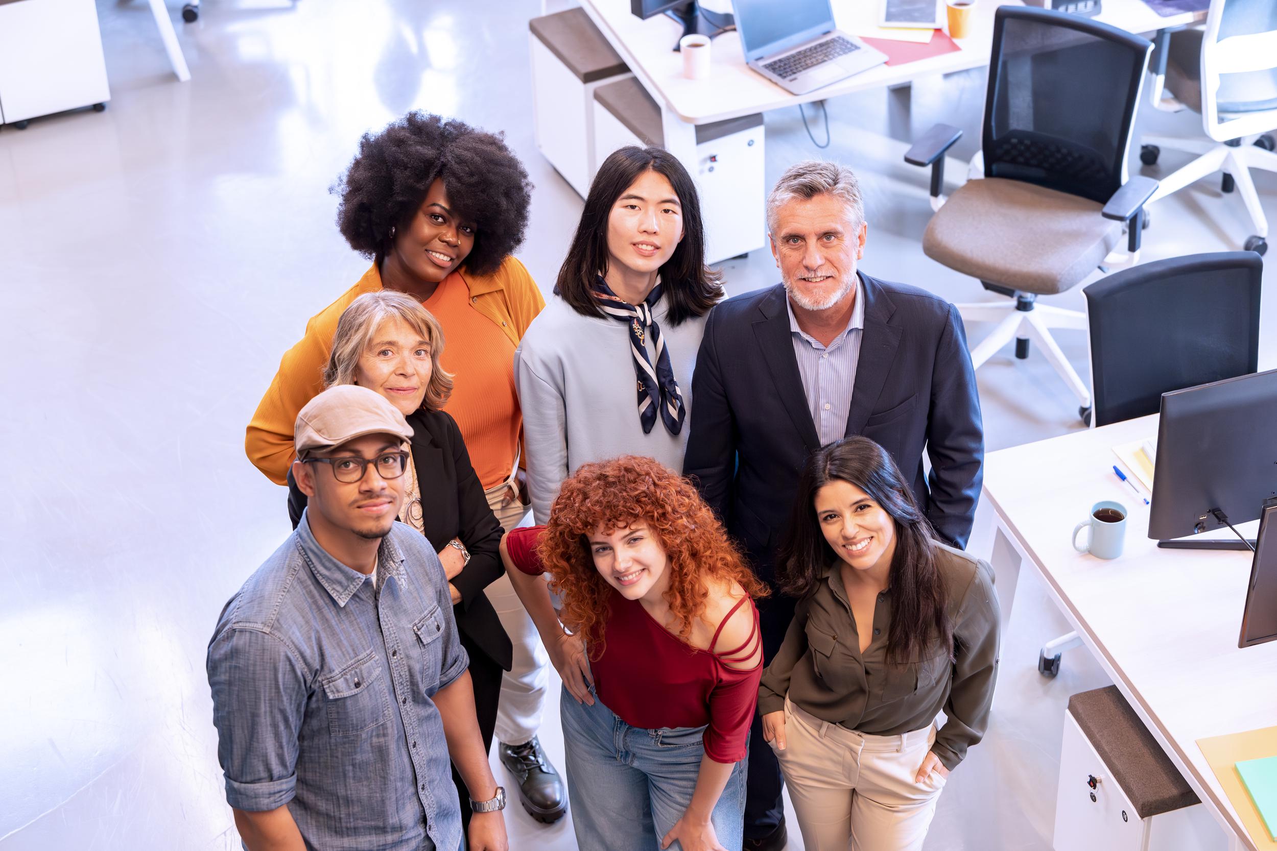 diverse-business-team-smiling-while-posing-togethe-2024-12-02-14-01-45-utc.jpg