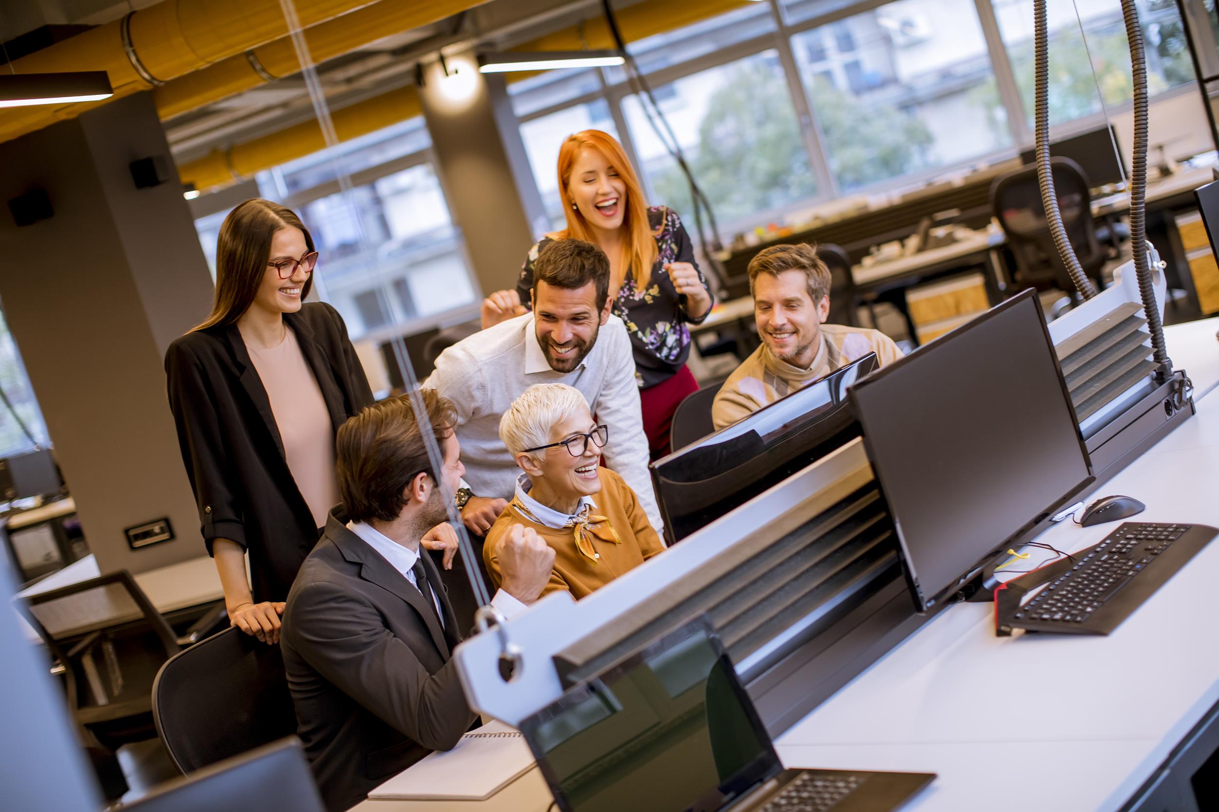 senior-businesswoman-working-together-with-young-b-2025-02-21-20-33-41-utc.jpg