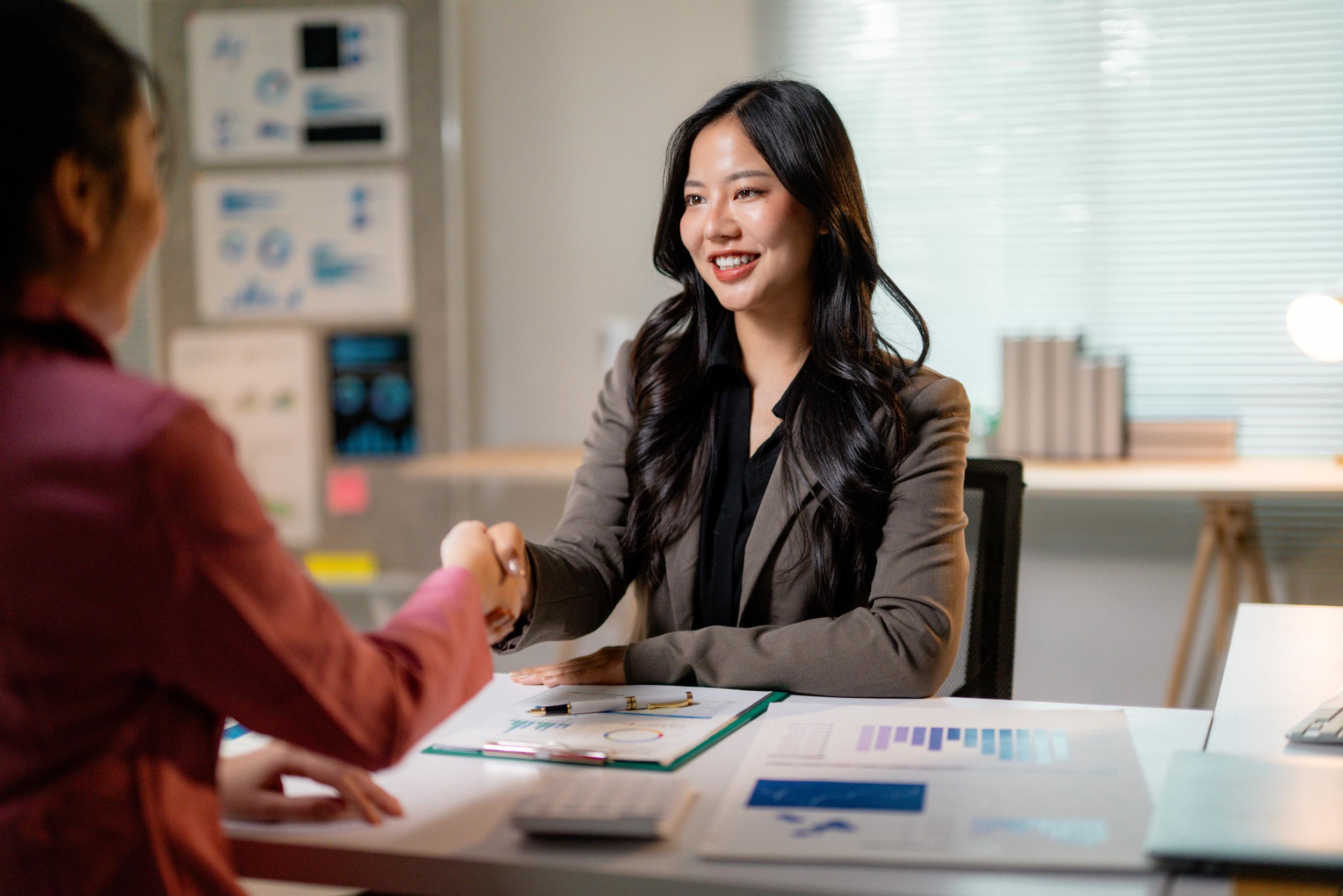 businesswomen-shaking-hands-after-reaching-an-agre-2025-06-10-10-45-29-utc.jpg