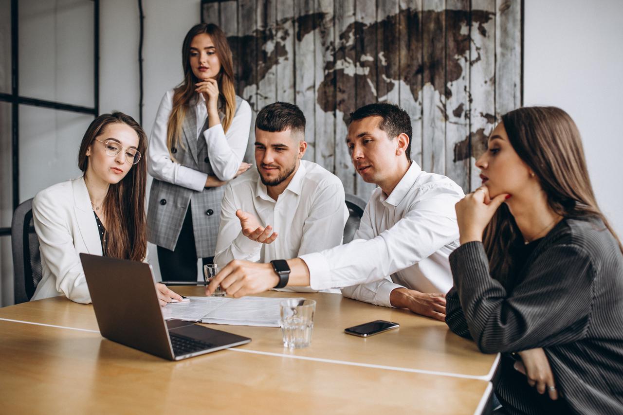 group-people-working-out-business-plan-office.jpg
