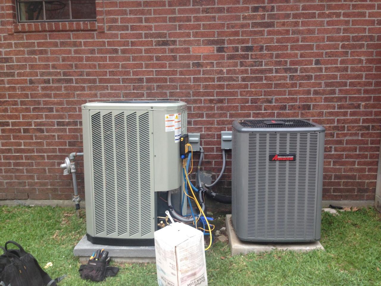 Amana air conditioning condenser replacement at a brick home in Spring, TX