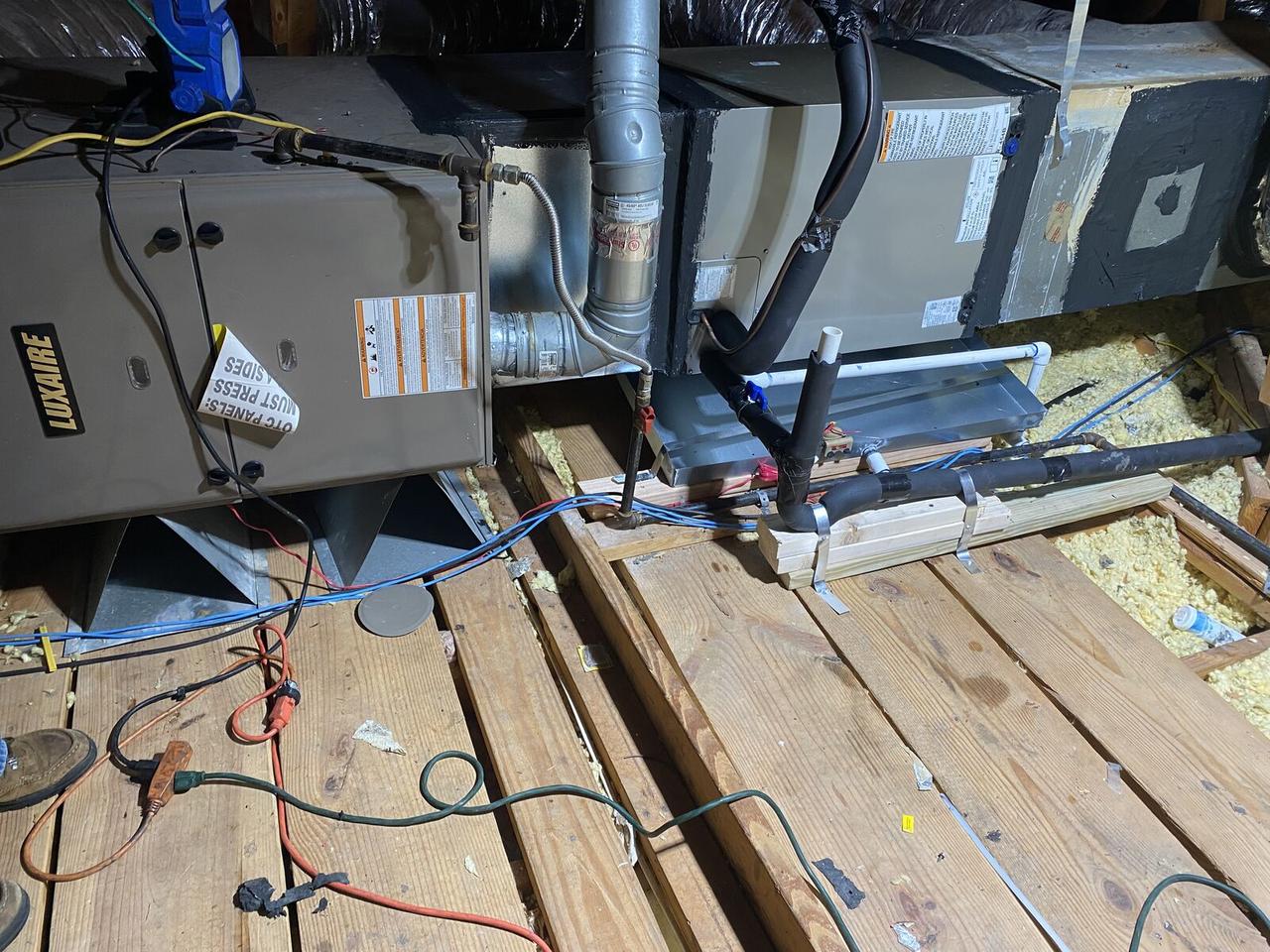 Luxaire furnace and evaporator coil installed in an attic HVAC system in Spring, TX