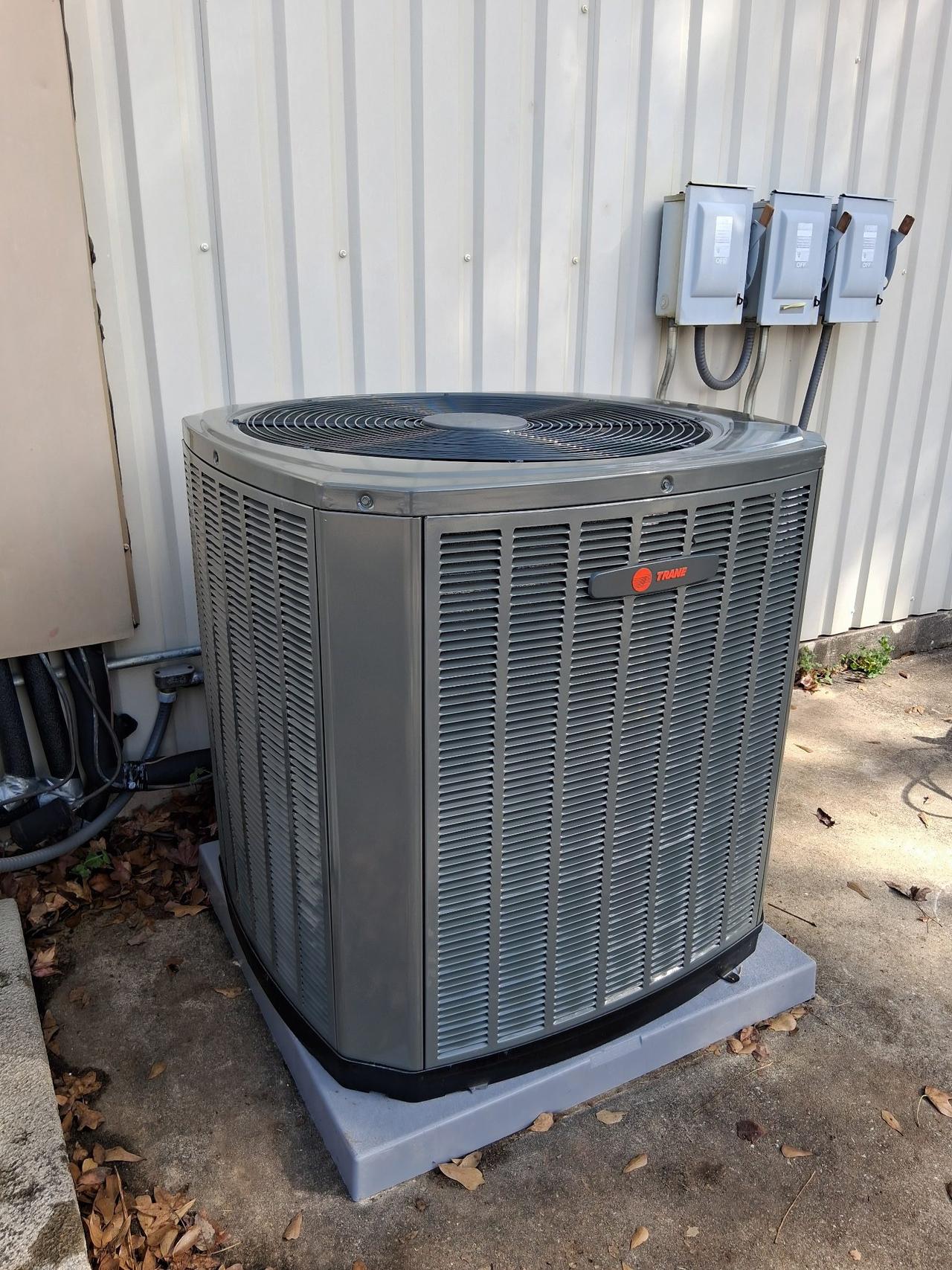 Multiple commercial Trane condensers serviced by AC Repair Expo at a North Houston property