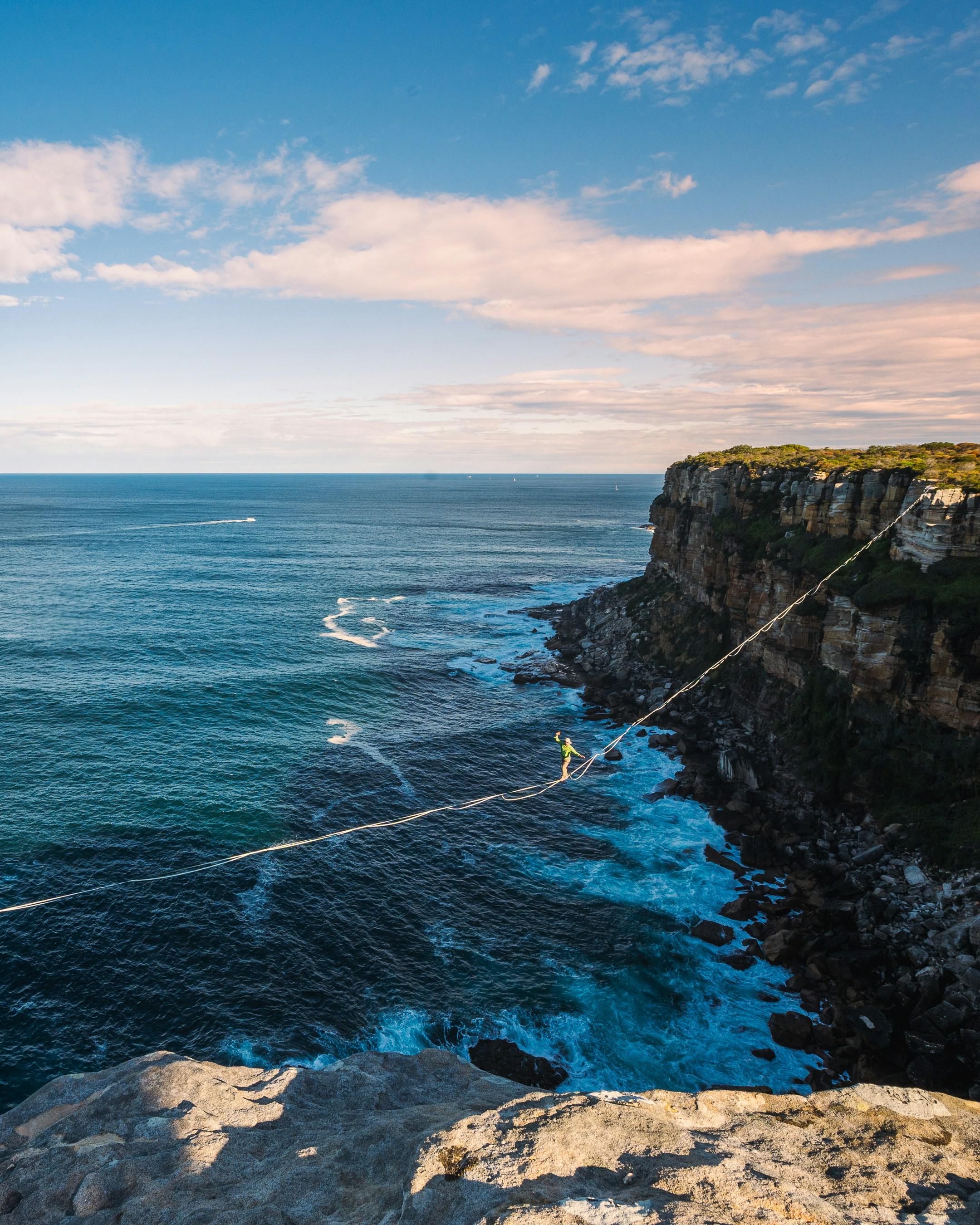 Highlining between the cliffs around the Sydney Region.
