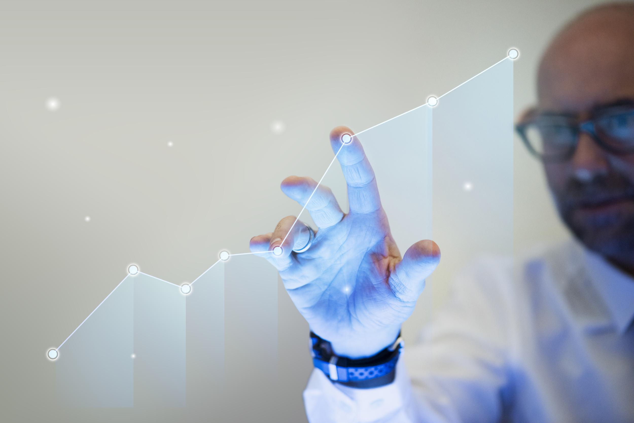 Businessman analyzing a graph