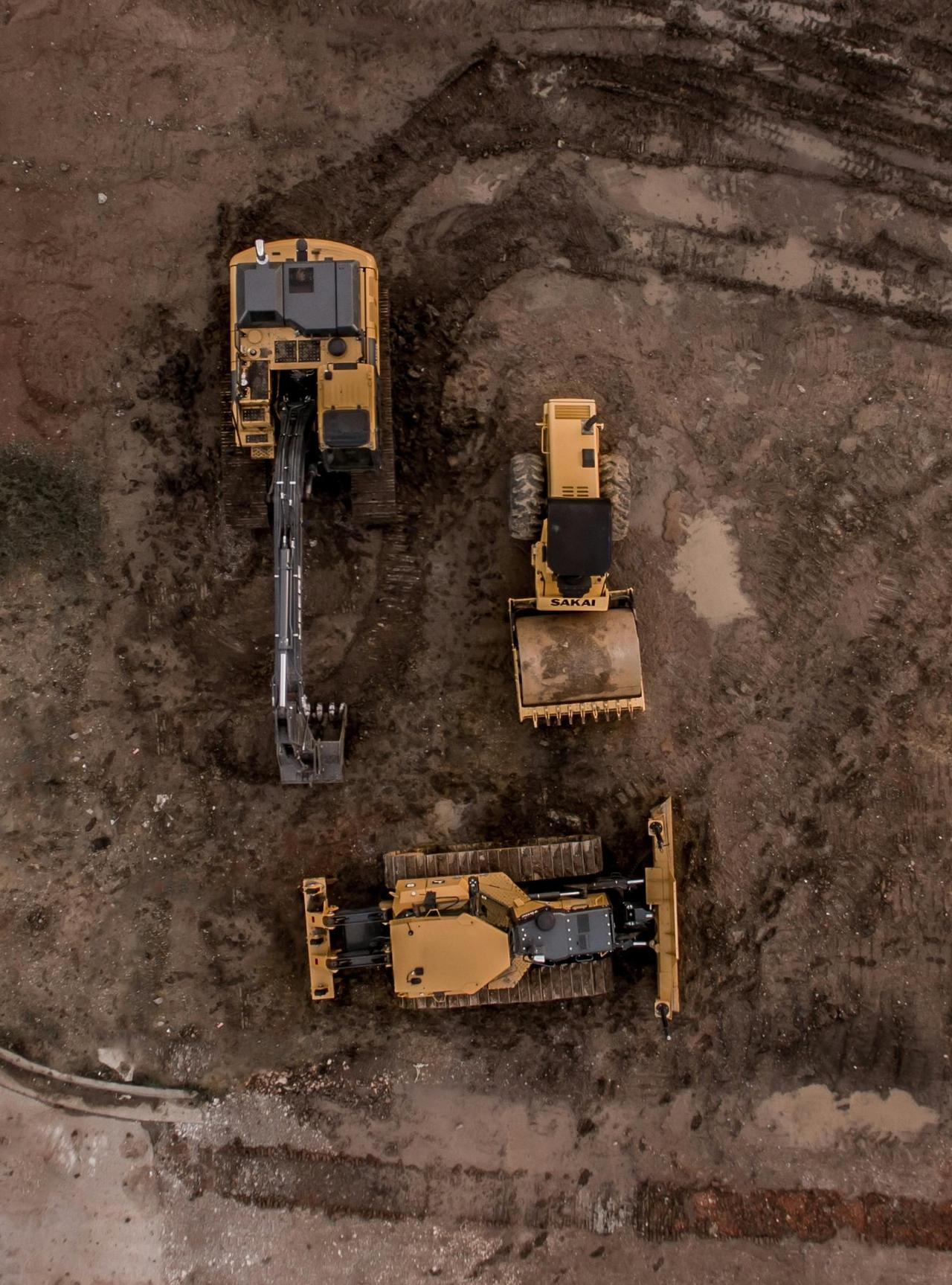 Construction job site with tracking grid overlay