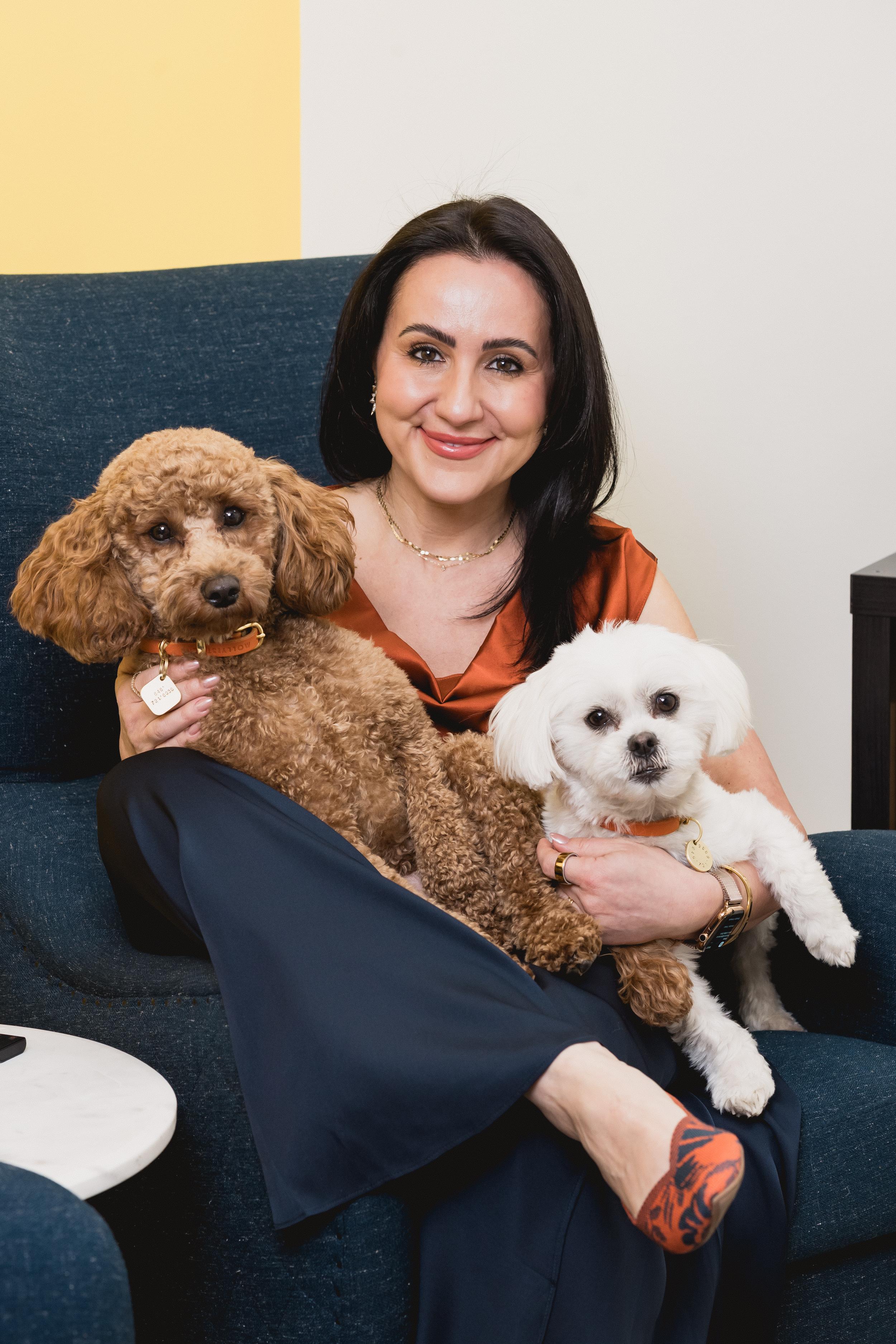 inessa-makdulina-nyzio-dietitian-stamford-ct-with-dogs.jpg<br>Inessa Makdulina-Nyzio, registered dietitian in Stamford, CT, smiling with her two dogs in a personal photo on the About page.